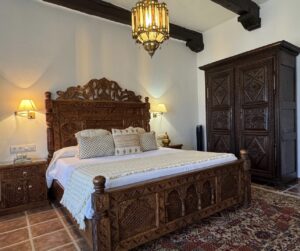 Hand-carved bed in Jose Luis’s home in Spain
