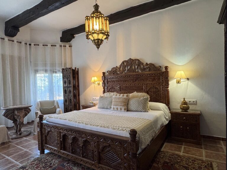 Hand-carved bed in Jose Luis’s home in Spain