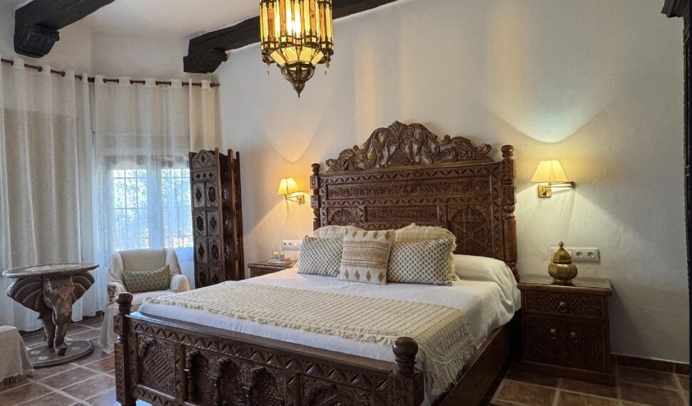 Hand-carved bed in Jose Luis’s home in Spain