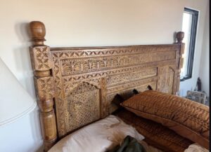 Hand-carved bed in Todd’s home in USA