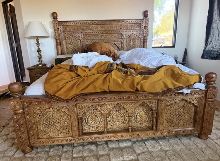 Hand-carved bed in Todd’s home in USA